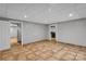 Spacious living room with tile floors and multiple entryways for easy access at 408 Camelot Dr, Salisbury, NC 28144