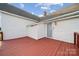 Exterior view of the large back deck with a door to enter the house at 411 S Central Ave, Landis, NC 28088