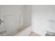 A clean, well-maintained bathroom with a tub and shower combination at 411 S Central Ave, Landis, NC 28088