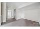 Versatile bonus room with neutral carpeting, ample space, and natural light, perfect for a home office or playroom at 411 S Central Ave, Landis, NC 28088