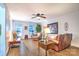 Comfortable living room with hardwood floors, complemented by leather furniture and natural light at 5437 Mallard Ln, Gastonia, NC 28052