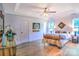 Spacious main bedroom featuring a tray ceiling, ample lighting, and hardwood floors at 5437 Mallard Ln, Gastonia, NC 28052