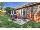 An outdoor space featuring an outdoor dining set and BBQ perfect for entertaining and relaxing in a tranquil outdoor setting at 5476 Twelve Oak Ln, Conover, NC 28613