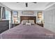 Bedroom with a large bed, matching nightstands, and calming wall art at 5476 Twelve Oak Ln, Conover, NC 28613