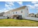 Spacious backyard with a privacy fence, covered patio, and ample green space at 5580 Soft Shell Dr, Lancaster, SC 29720