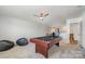 Bright game room featuring a billiard table, bean bag chairs, and a ceiling fan at 5580 Soft Shell Dr, Lancaster, SC 29720