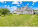 Expansive backyard featuring lush green grass, providing ample space for recreation and relaxation at 586 Brookhaven Dr, Fort Mill, SC 29708