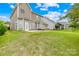 Spacious backyard, with a patio and lush green grass, perfect for outdoor activities and entertaining at 586 Brookhaven Dr, Fort Mill, SC 29708