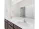 Bathroom featuring double sink vanity and large mirror at 586 Brookhaven Dr, Fort Mill, SC 29708