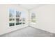 Bright bedroom with large windows and carpeted floors at 586 Brookhaven Dr, Fort Mill, SC 29708
