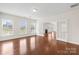 Open living area with hardwood floors and glass doors provides a seamless flow between indoor and outdoor spaces at 586 Brookhaven Dr, Fort Mill, SC 29708