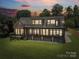 Spacious back porch area with seating, perfect for entertaining guests or relaxing outdoors at 5985 Natoma Rd, Clover, SC 29710