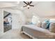Charming bedroom with sloped ceilings, wood floors, and a sitting area at 5985 Natoma Rd, Clover, SC 29710