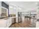 Bright kitchen with stainless steel appliances, lake views, white cabinetry, and an open concept design at 5985 Natoma Rd, Clover, SC 29710