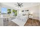 Serene main bedroom with a ceiling fan, sliding glass doors, and water views at 5985 Natoma Rd, Clover, SC 29710