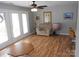 Inviting living room with hardwood floors, neutral walls and bright french doors at 6148 Meadow Rose Ln, Charlotte, NC 28215