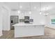 Bright kitchen featuring a large island, stainless steel appliances, and stylish pendant lighting at 650 Wabash Ave # 1, Charlotte, NC 28208