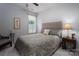 Comfortable bedroom with a well-made bed with paisley linens, soft natural light from the window, and cozy decor at 658 Gardenbrook Trl, Belmont, NC 28012