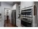 Bright kitchen featuring stainless steel appliances, double ovens, and lots of storage space at 658 Gardenbrook Trl, Belmont, NC 28012