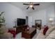 Spacious living room with neutral tones, comfortable seating, a coffee table, and an entertainment center at 658 Gardenbrook Trl, Belmont, NC 28012