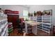 Well-organized office with ample storage, featuring a puzzle table, and cheerful decor for a productive space at 658 Gardenbrook Trl, Belmont, NC 28012