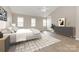 Bright bedroom offers ample space, natural light, and a serene atmosphere for relaxation at 6603 Brenock Ln, Charlotte, NC 28269