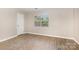 Bedroom with a window and closet features light, airy space at 6603 Brenock Ln, Charlotte, NC 28269