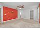 Bedroom featuring a ceiling fan and bright patterned wall at 7079 Waterwheel Sw St, Concord, NC 28025