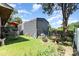 Large backyard with a metal shed, grill, and ample green space at 816 Radio Rd, Statesville, NC 28677