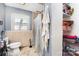 Functional bathroom features a shower/tub combo and convenient linen storage at 816 Radio Rd, Statesville, NC 28677
