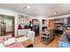 Efficient kitchen boasts stainless steel fridge, bright white accents, and an adjacent dining table at 816 Radio Rd, Statesville, NC 28677