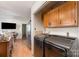 Convenient laundry area featuring a new washer and dryer set adjacent to the kitchen at 816 Radio Rd, Statesville, NC 28677