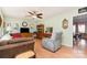 Comfortable living room with laminate floors, a ceiling fan, and a neutral paint at 816 Radio Rd, Statesville, NC 28677