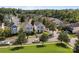 An aerial view of a neighborhood showing the houses, streets, and greenery, providing a sense of community at 9704 Grier Springs Ln, Charlotte, NC 28213
