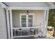 Cozy porch with comfortable seating, perfect for relaxing and enjoying the outdoors at 9704 Grier Springs Ln, Charlotte, NC 28213