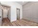 Bright bedroom with wood floors, detailed trim work, and a modern design at 101 Bryan St, Kannapolis, NC 28083