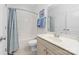 Bright bathroom featuring a large vanity, soaking tub, and separate shower with neutral color palette at 10320 Lemington Dr, Mint Hill, NC 28227