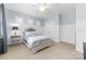 Bright bedroom featuring paneled walls, a decorative ceiling fan, and lots of natural light at 10320 Lemington Dr, Mint Hill, NC 28227