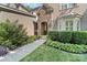 Charming stone-accented entrance with well-manicured landscaping and a welcoming walkway at 10320 Lemington Dr, Mint Hill, NC 28227