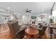 Comfortable living room with fireplace, built-ins, and stairs to the upper level at 10320 Lemington Dr, Mint Hill, NC 28227