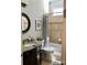 Charming bathroom with granite countertops and a tiled shower-tub combo at 104 Bunker Way, Mooresville, NC 28117