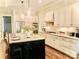Spacious kitchen with granite countertops, stainless steel appliances, and a large island at 104 Bunker Way, Mooresville, NC 28117