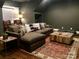 Relaxing living room with comfortable seating and a rustic wooden coffee table at 104 Bunker Way, Mooresville, NC 28117