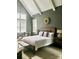 Serene main bedroom with high ceilings, neutral colors, and ample natural light at 104 Bunker Way, Mooresville, NC 28117