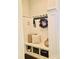 Functional mudroom with built-in bench, storage, and coat hooks at 104 Bunker Way, Mooresville, NC 28117