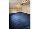 Spacious bedroom with neutral paint, vaulted ceiling, and blue carpeting at 10607 Old Bridge Ln, Charlotte, NC 28269