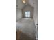 Bright bedroom with vaulted ceiling, fan and neutral carpeting at 10607 Old Bridge Ln, Charlotte, NC 28269