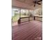 Cozy, covered deck with fan, ideal for outdoor relaxation at 10607 Old Bridge Ln, Charlotte, NC 28269