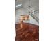 Hardwood floors lead to an open floor plan with stairs and a modern kitchen at 10607 Old Bridge Ln, Charlotte, NC 28269