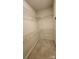Walk-in closet featuring shelving for optimal organization at 10607 Old Bridge Ln, Charlotte, NC 28269